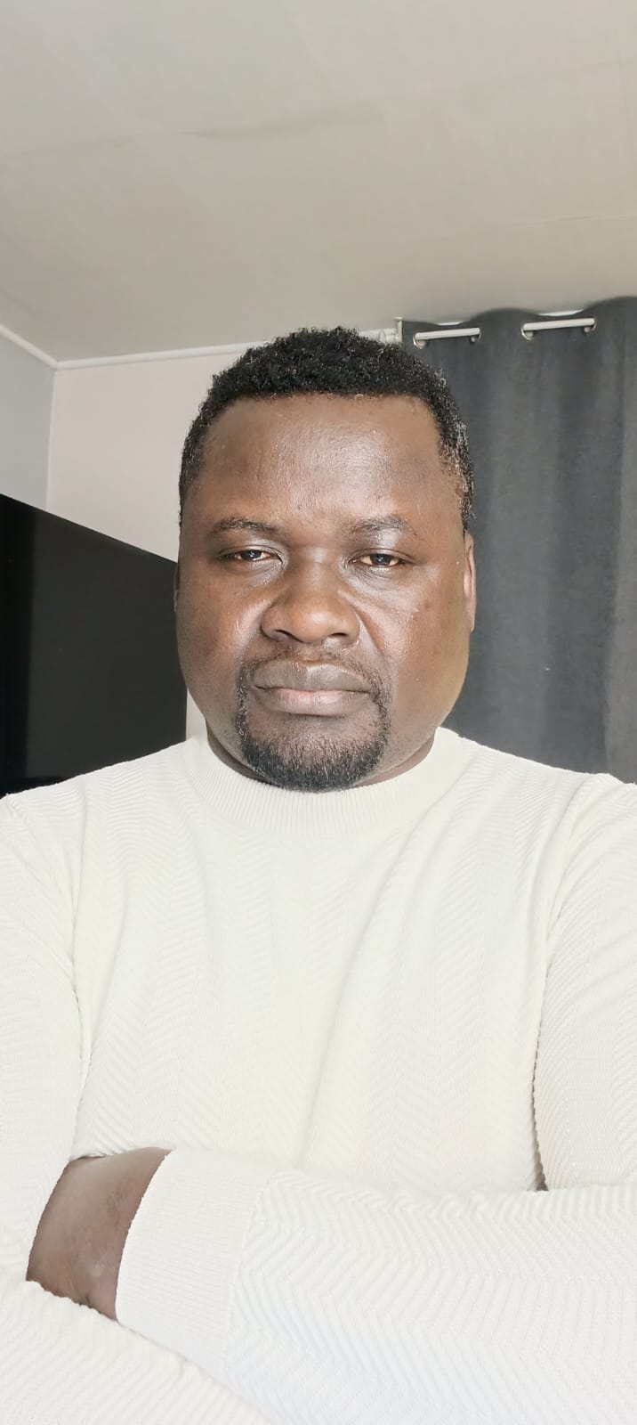Rév. Elvis NGUIFFO